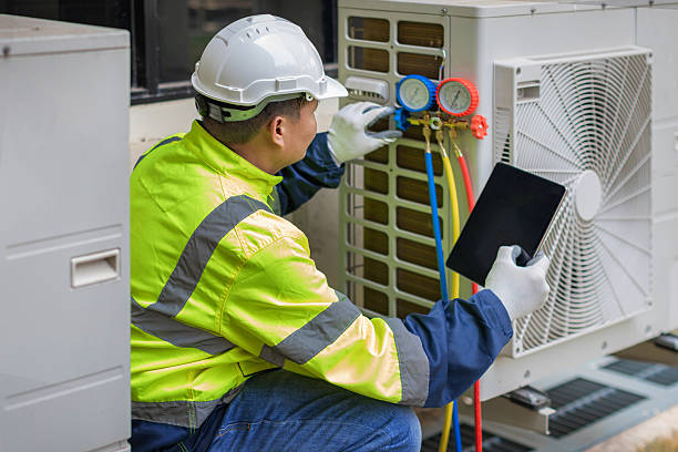 Professional Ac Installation technician working in Nine Mile Falls, WA